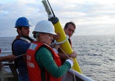 Scientists deploy an Argo probe. (Photo: Elizabeth Crapo, NOAA)