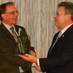 Craig McLean presents the 2014 NOPP Excellence in Partnering Award to Dr. Kenneth Johnson, Senior Scientist at the Monterey Bay Aquarium Research Institute (MBARI)